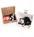 Off-white and light oak wooden poker cases with cards and dice
