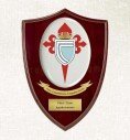 Custom crest plaque on heart-shaped mahogany wood with oval porcelain