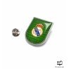 Custom shield pin in nickel finish with full-colour crest and crystal effect, next to its butterfly clutch