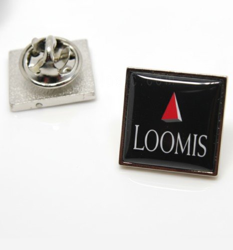 Custom square pin in nickel finish with colour logo and crystal effect, next to the back with its clutch