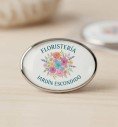 Pin ovalado metálico acabado níquel personalizado con logo a color y efecto cristal