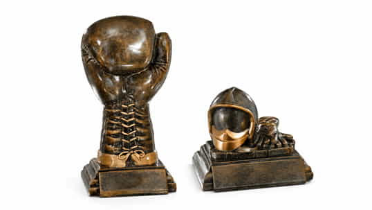 Catálogo de trofeos de resina cerámica y portadiscos para premios deportivos y reconocimientos